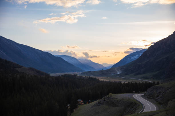istock Chui road going into the sunset Altai mountains 1340587172