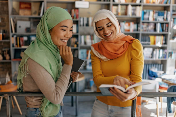 istock Modern Muslim Women in a library 1340588390