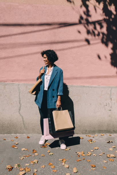 istock Beautiful Woman in Shopping 1340589272