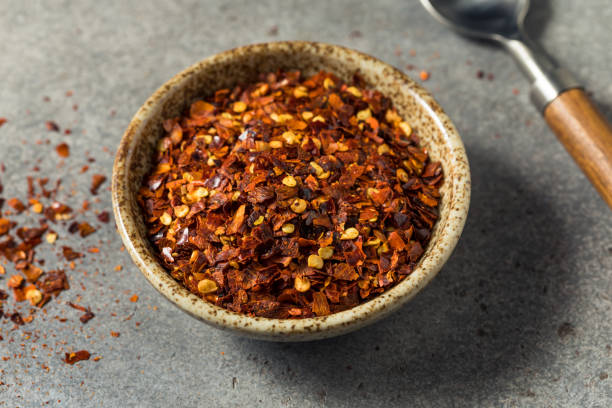 istock Organic Raw Red Pepper Flakes 1340589310