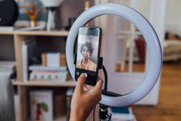 istock Cheerful Woman Vlogging at Home 1340589323