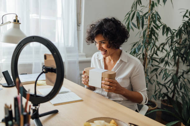 istock Cheerful Woman Vlogging at Home 1340589350