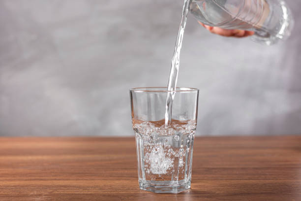 istock Glass of fresh water on the table. 1340592702