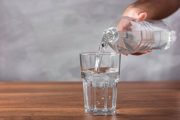 istock Glass of fresh water on the table. 1340592704