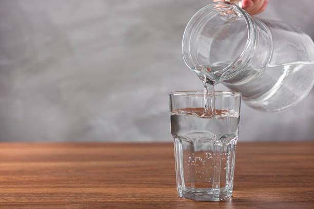 istock Glass of fresh water on the table. 1340592714