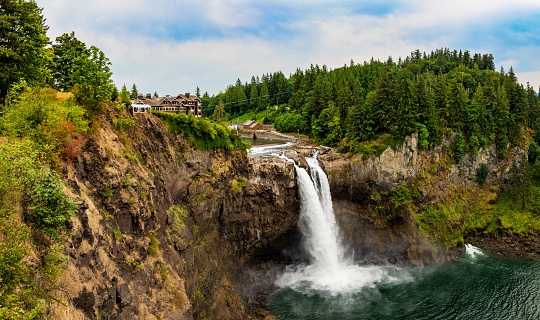 Snoqualmie Falls with Power Station and Snoqualmie Lodge During Summer. Located in the Pacific Northwest in Washington State.