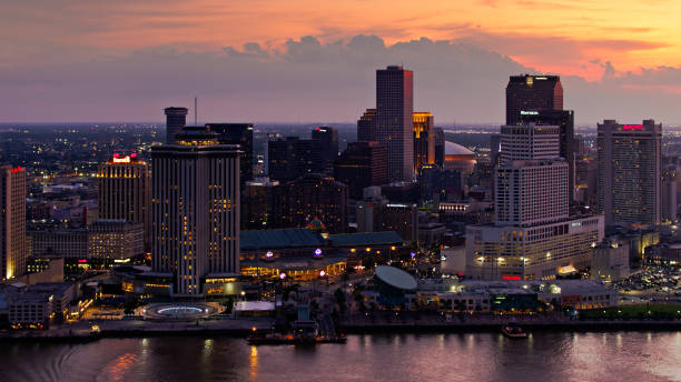 istock Dramatic Sunset Sky Behind New Orleans Central Business District - Aerial 1340600566