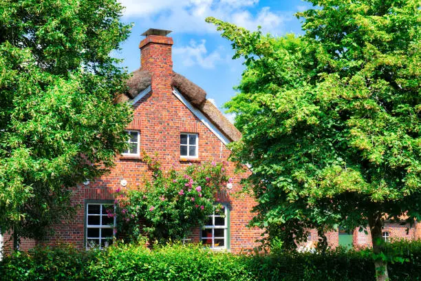 Traditional frisian brick house in Wiesmoor near Ottermeer, Friesland, Germany