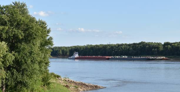 istock Barge on the Mississippi River in summer 1340602212