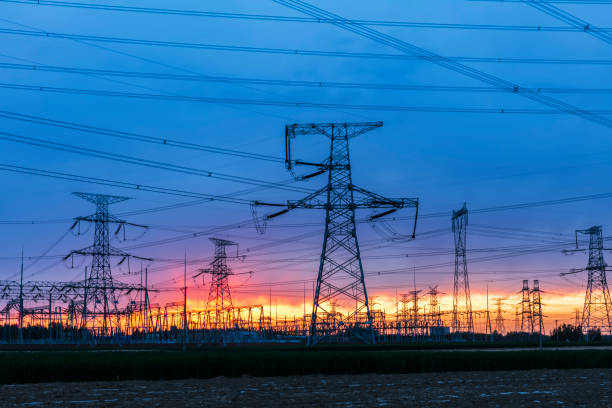 istock Pylons, high voltage pylons in the evening 1340602963