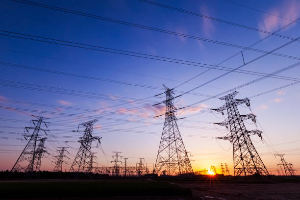 istock Pylons, high voltage pylons in the evening 1340602968