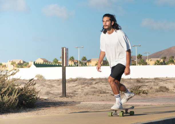 istock Young skater riding on the street 1340603824