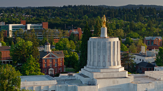 Aerial shot of the state capitol building in Salem, Oregon on a summer evening. \n\nAirspace authorization was obtained from the FAA for this operation.