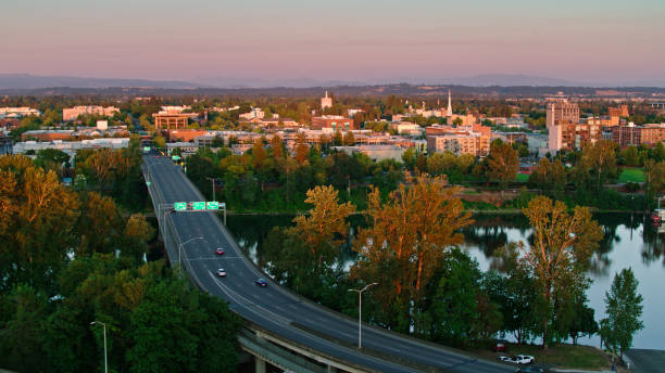 istock Center St Bridge Heading Into Downtown Salem, OR at Dusk - Drone Shot 1340606063