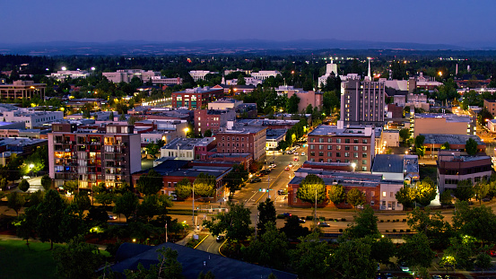 Aerial shot of Salem, Oregon on a summer night, looking along State Street towards the Oregon State Capitol Building. 

Airspace authorization was obtained from the FAA for this operation.