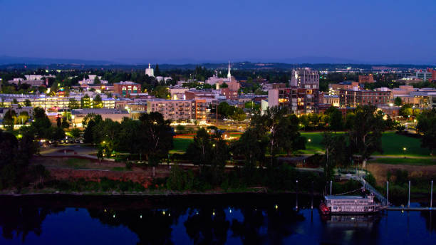 istock Willamette River Flowing through Salem, Oregon at Night - Aerial 1340606107