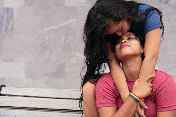 istock lesbian couple on a park bench 1340614005