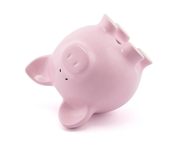 istock Pink piggy bank upside down. Clipping path included 134061432