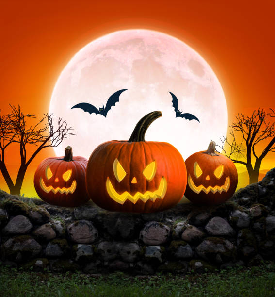 istock Halloween Background  , Scary Pumpkins in Forest , halloween concept , red tone 1340617671