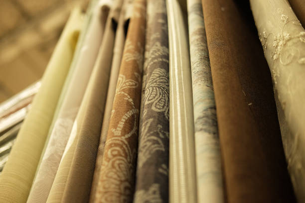 istock Rolls of fabric and textiles in store 1340619800