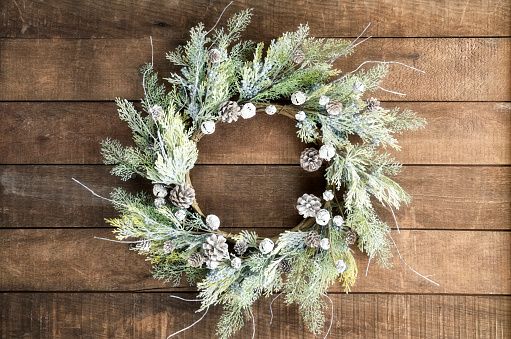 Christmas wreath on an old wood background