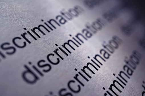 close up shot of word discrimination
