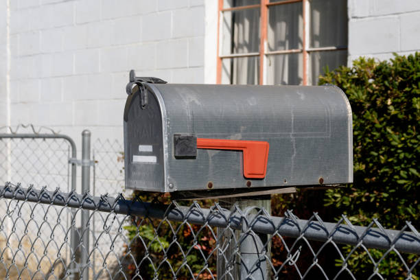 istock Closed US mailbox approved by the postmaster general with lowered red flag 1340637288