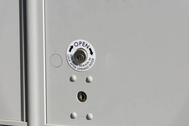 istock Mailbox lock with instructions on how to open with curved arrow on locker 1340637289