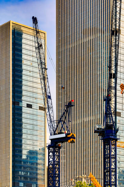 istock Tower crane in the middle of the building complex 1340639167