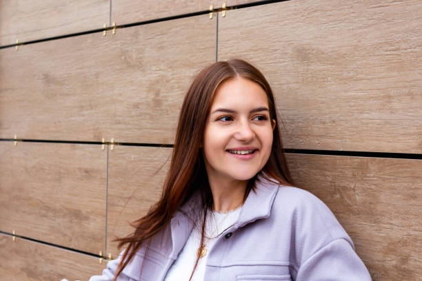 istock Young caucasian woman looking right. Student life. 1340639311
