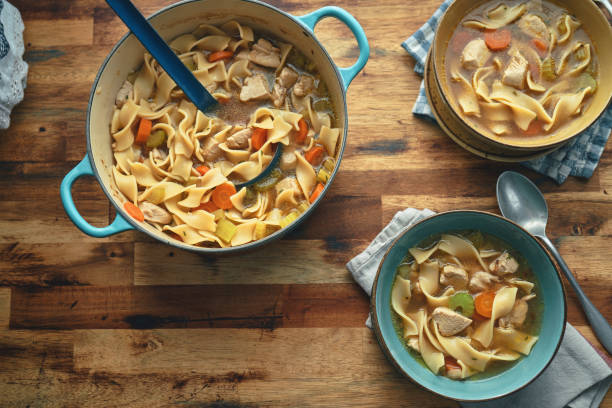 istock Chicken Noodles Soup with Fresh Vegetables 1340640571