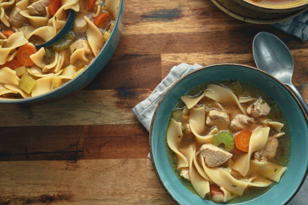 istock Chicken Noodles Soup with Fresh Vegetables 1340640572