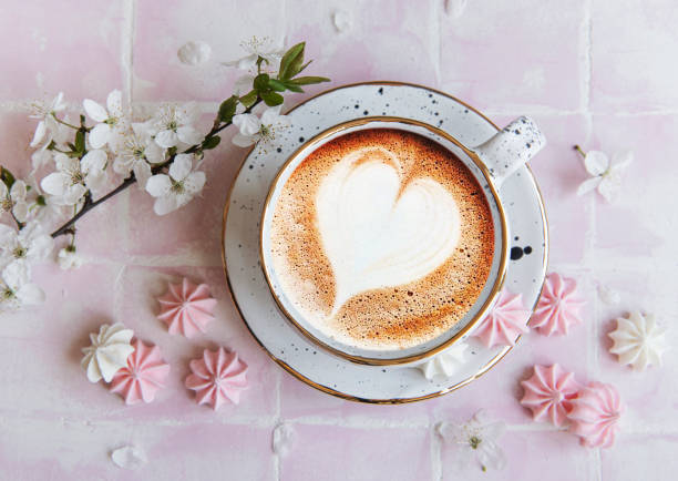 istock Cup with coffee and small meringues 1340640722