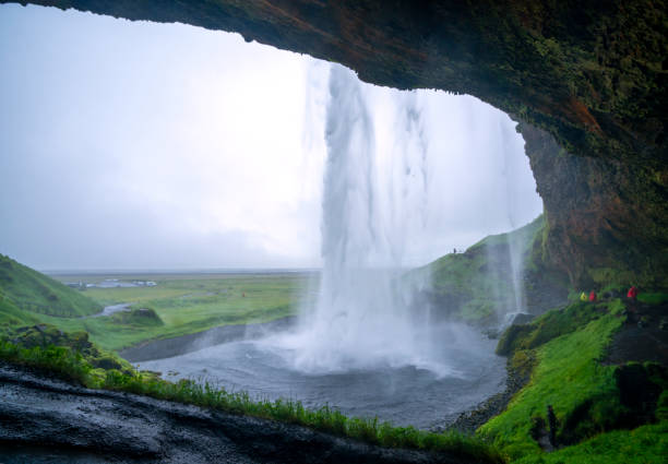istock Back view of Seljalandsfoss waterfall in Iceland 1340642079