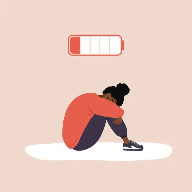 Vector illustration of Professional burnout. Exhausted african girl with low battery sitting on floor and crying. Mental health problem. Deadline, stress and fatigue concept. Vector illustration in flat cartoon style