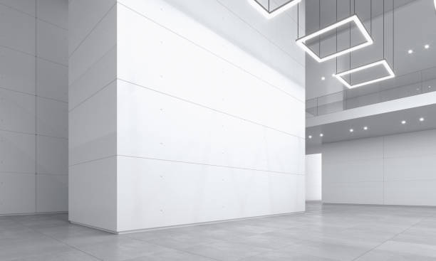 istock Large museum hall with white empty walls and bright light 1340652184