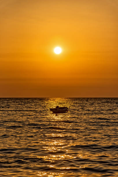 istock A boat at sunrise on the Adriatic Sea 1340654470