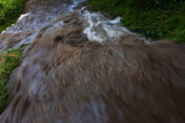 istock powerful waterfall with dirty water after 1340656374