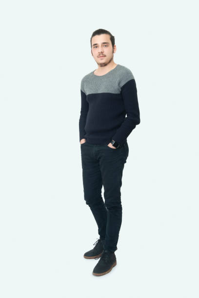 istock Portrait of handsome man looking at camera over white background 1340656459