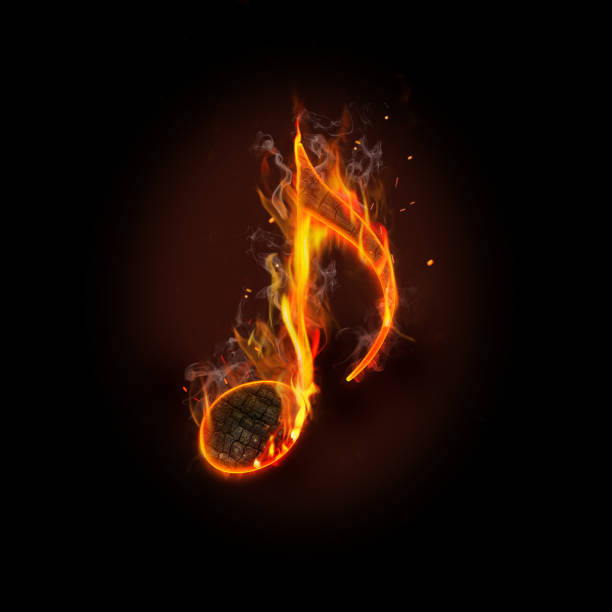 istock Creative image of flaming musical note on abstract dark background 1340659357