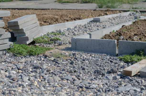 istock Plotted land parcel. Construction of new walkways. Gray concrete 1340660770