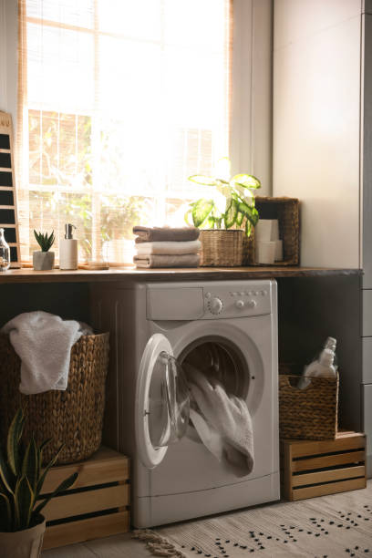 istock Stylish room interior with washing machine. Design idea 1340662161
