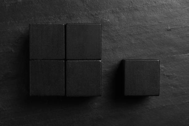 istock Flat lay composition with cubes on black slate background. Pareto principle concept 1340662173