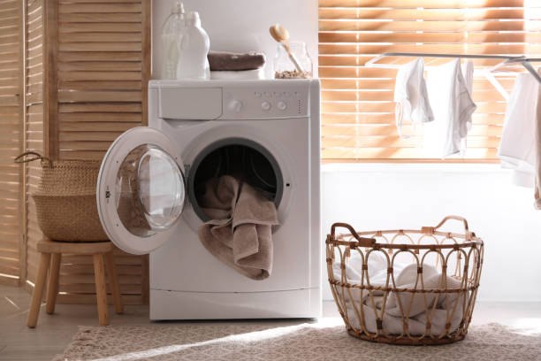 istock Stylish room interior with washing machine. Design idea 1340662421