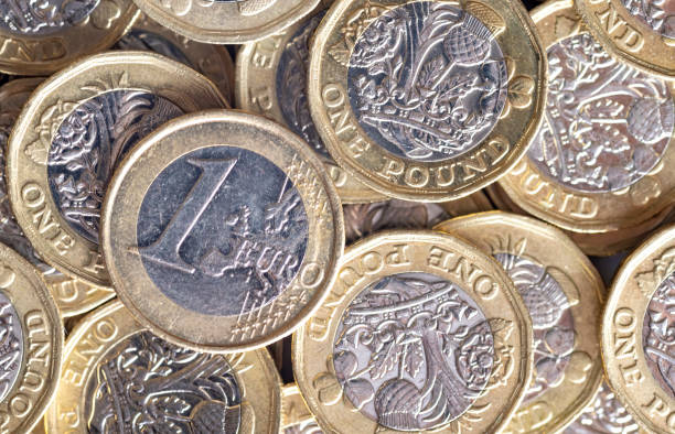 istock One pound coins and euro 1340662566