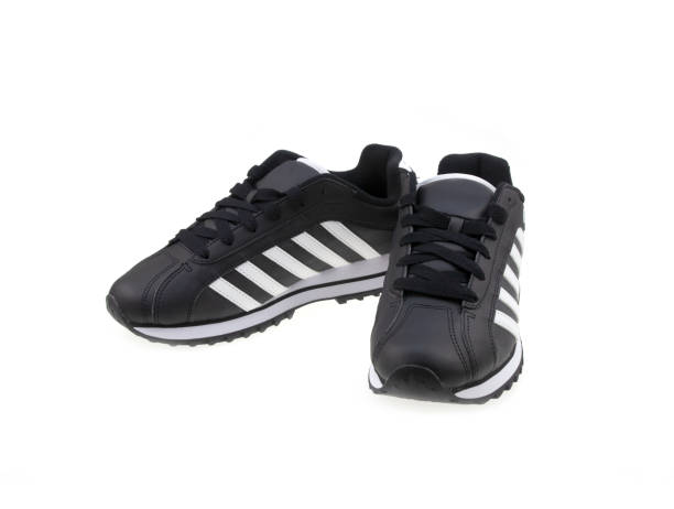 istock Men's black casual shoes on white background 1340662580