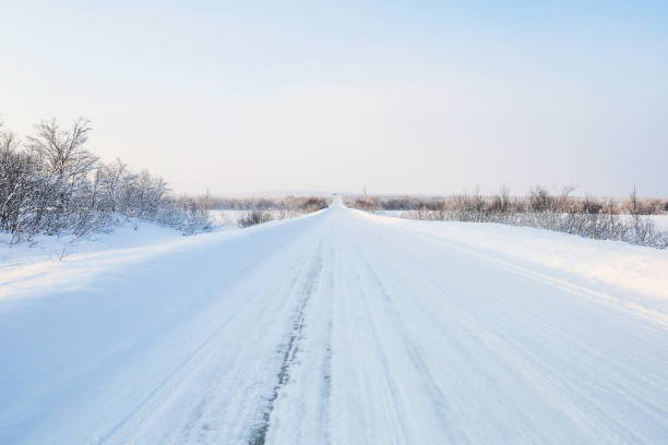 istock road at a sunny winter day 1340663533
