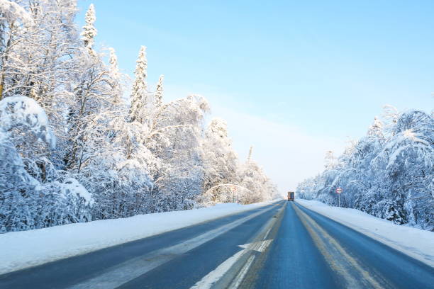 istock road at a sunny winter day 1340663535