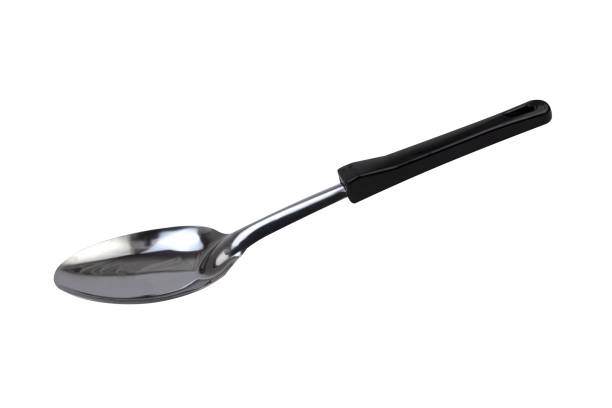 A ladle with a black plastic handle on a white background A ladle with a black plastic handle on a white background serving utensil stock pictures, royalty-free photos & images