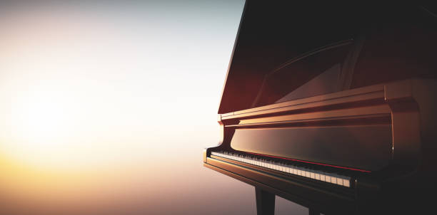 istock Grand piano keyboard on sunset sky 1340663864